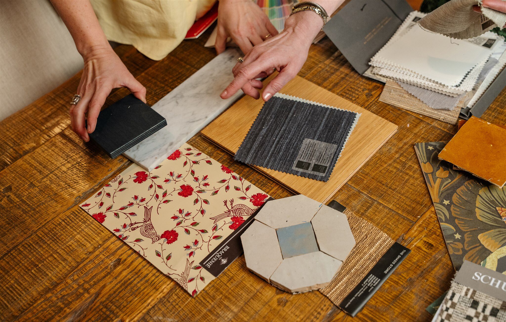 Interior Designer Rachel Jackson looking through samples and making selections